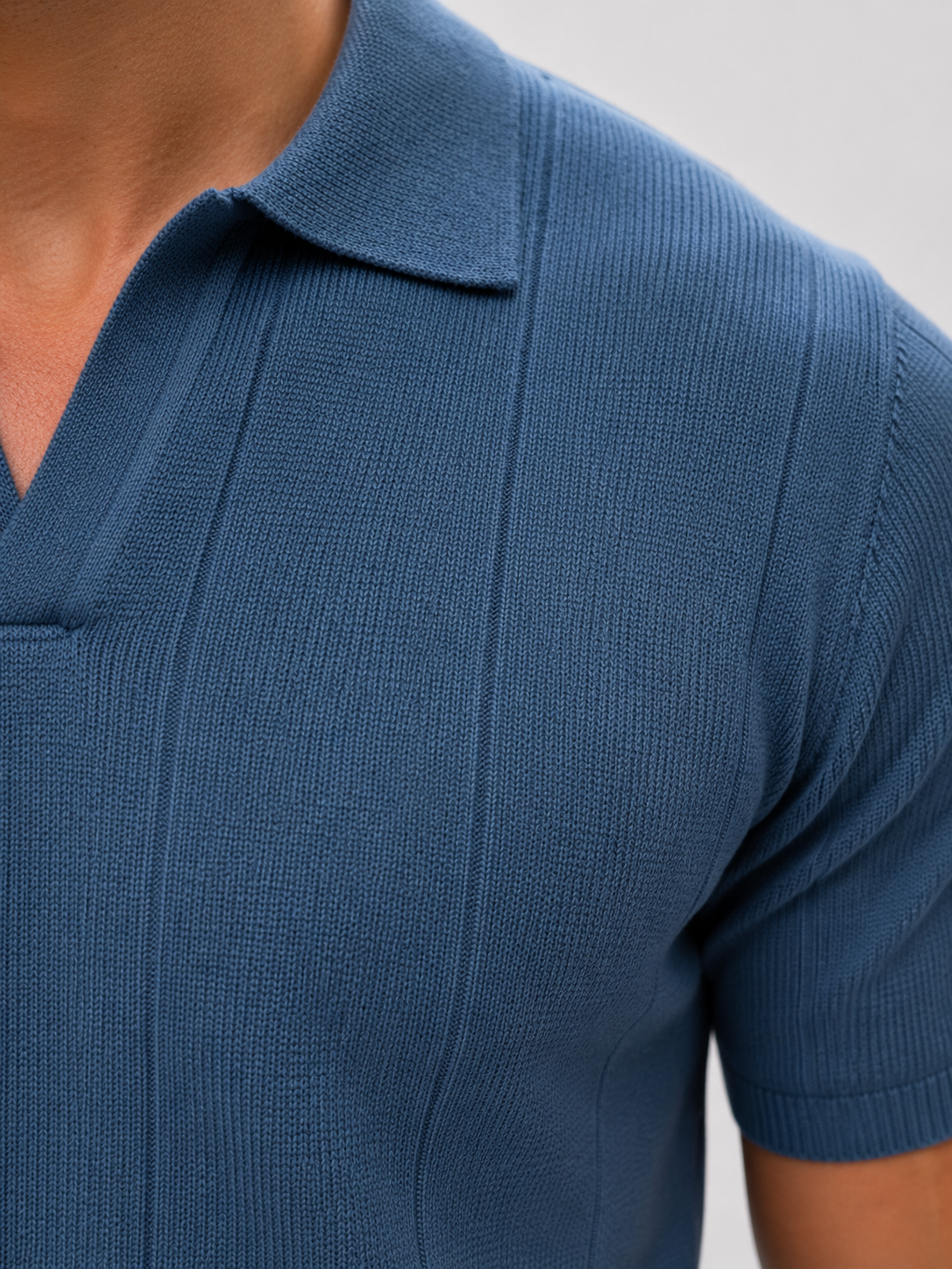 Buttonless knitwear polo short sleeve blue